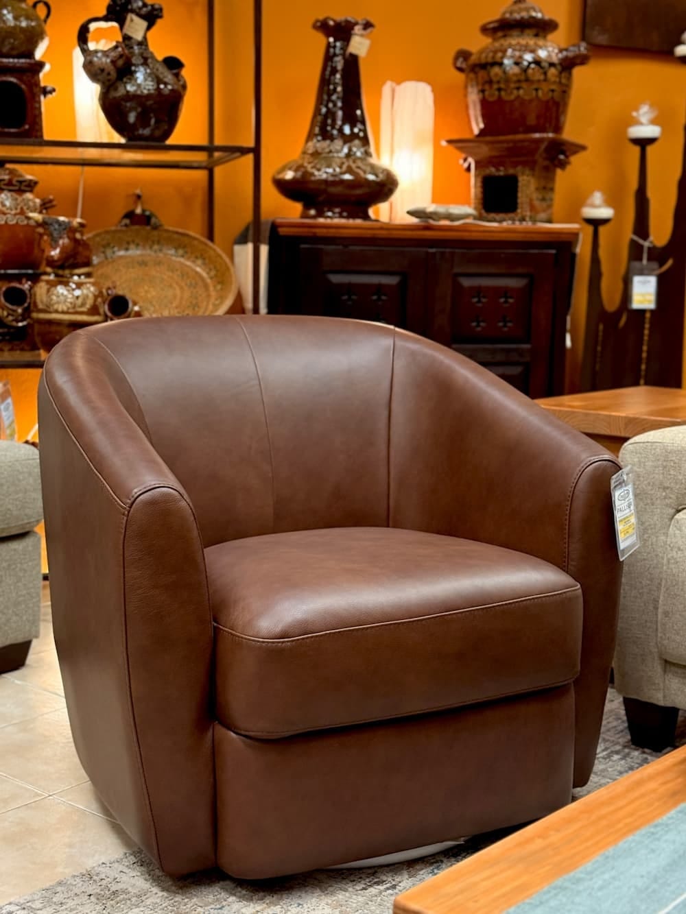 Palliser Dorset Swivel Chair in Chocolate Leather, photographed in the Casa Bonita showroom