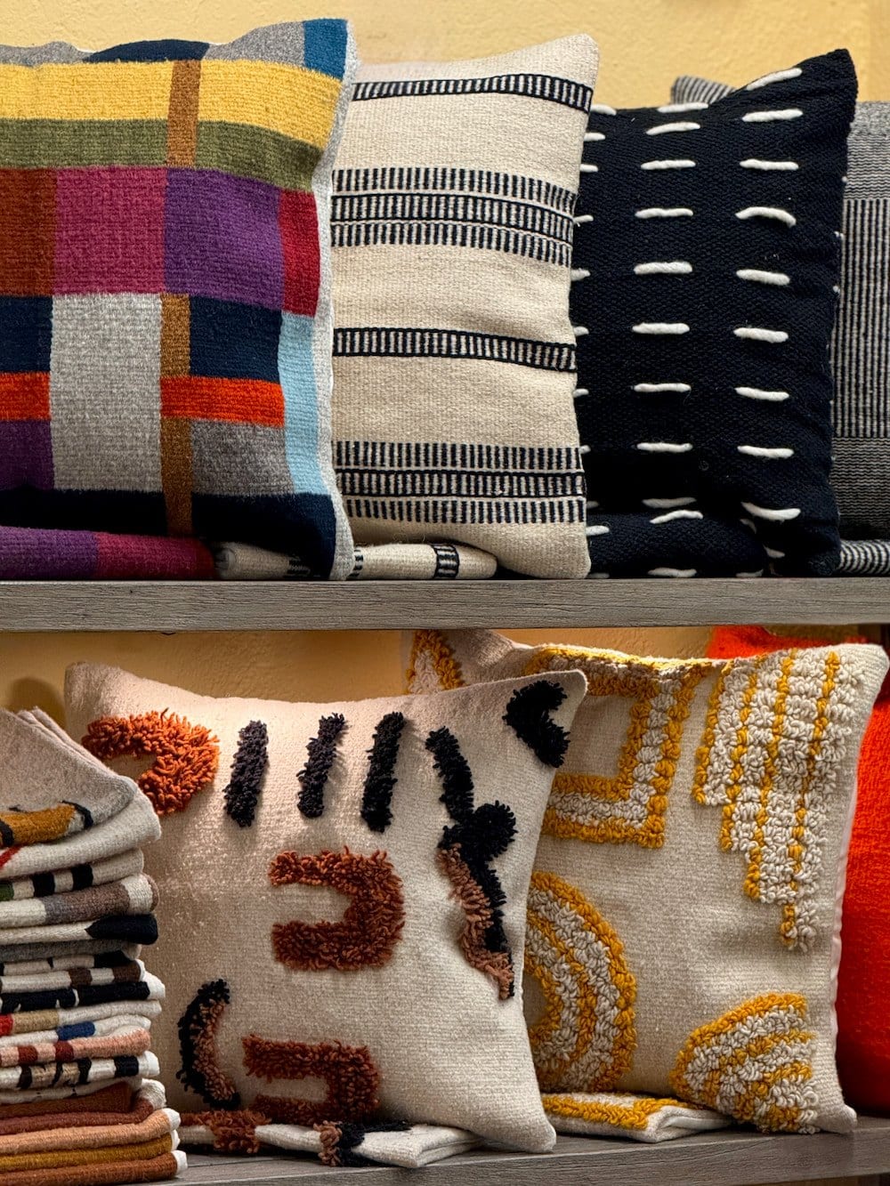 Wool decorative pillows from Oaxaca, dyed with cochineal and indigo