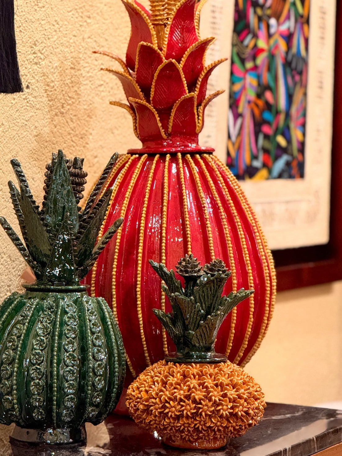 An assortment of clay piñas from San José de Gracia, Michoacán, built with the pastillaje technique